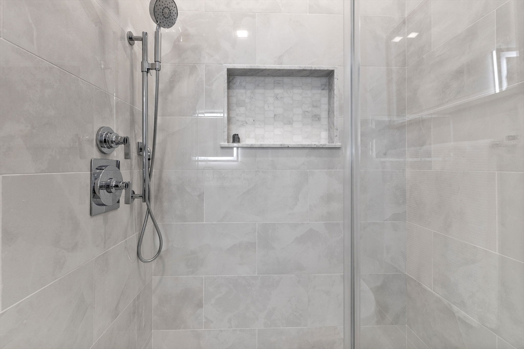 54 Springfield Street, Unit 1 Somerville, MA 02143 - Photo 36 of 38 a bathroom with a shower