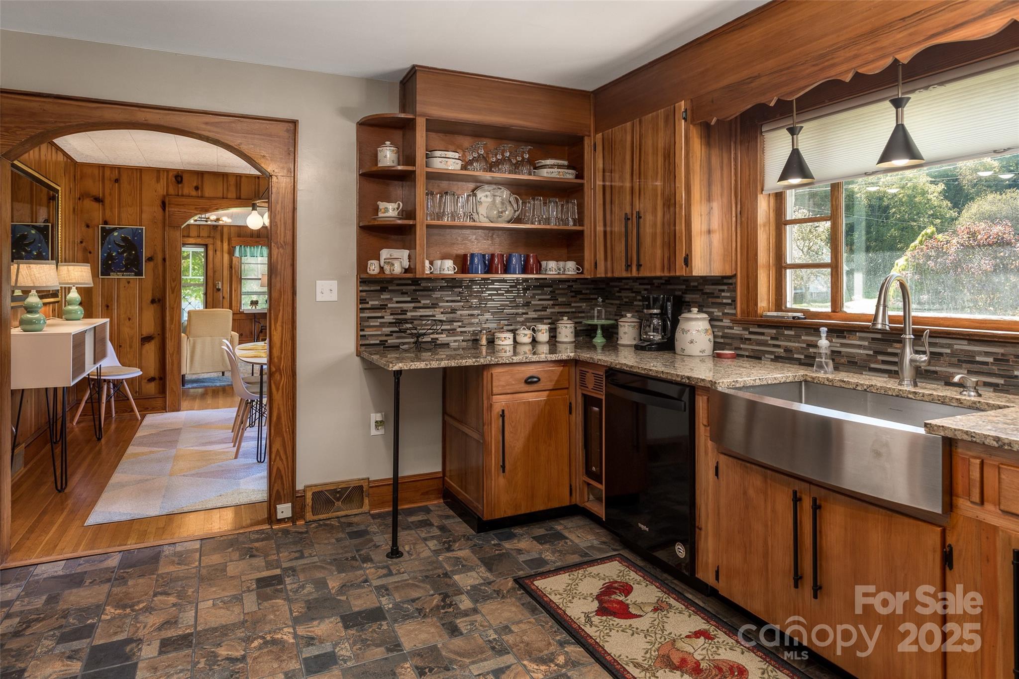14 Mann Farm Road Canton, NC 28716 - Photo 8 of 22 a kitchen with stainless steel appliances granite countertop a stove a sink and a microwave