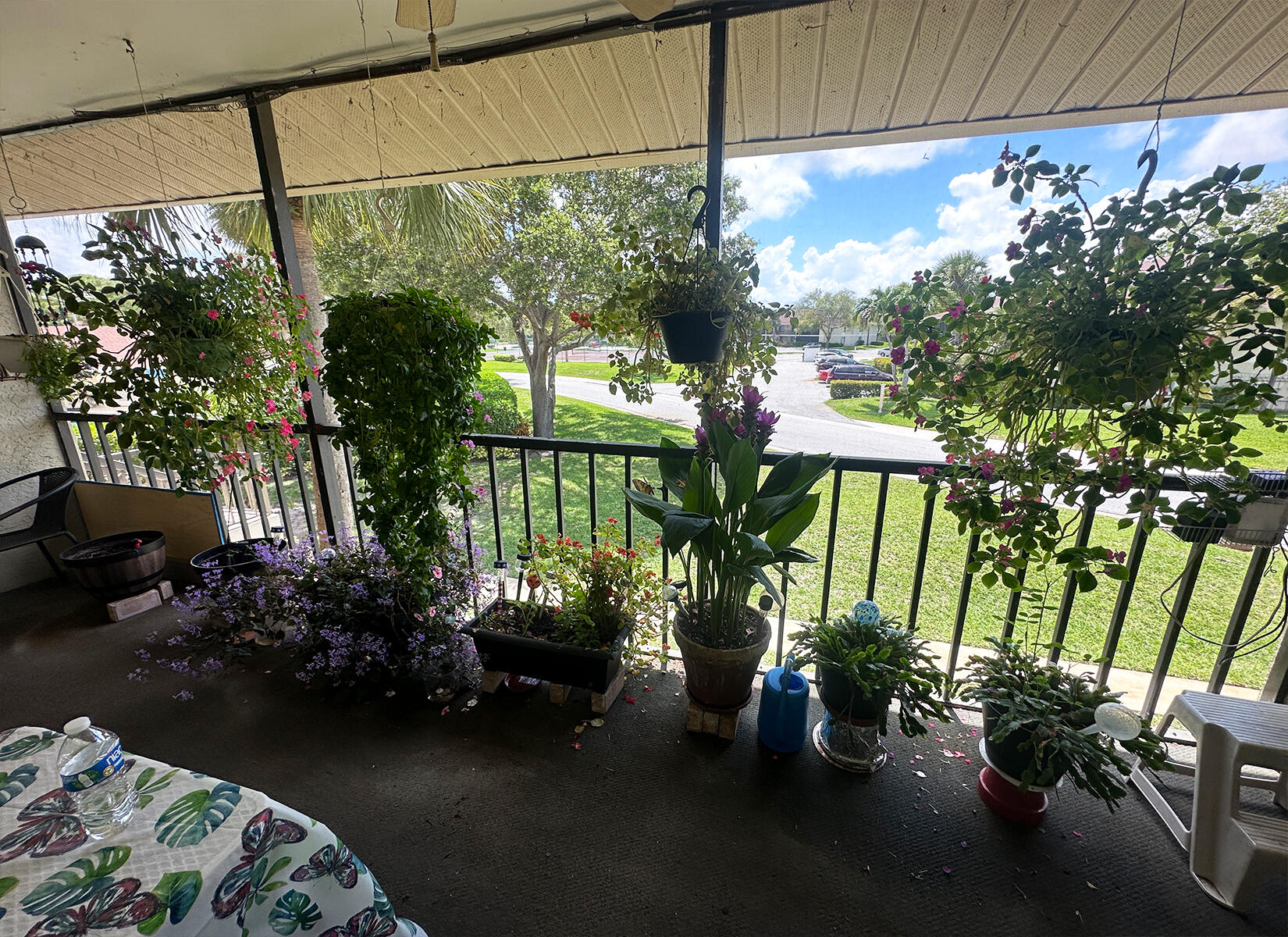 6543 Chasewood Drive, Unit E Jupiter, FL 33458 - Photo 12 of 15 Screened Balcony Patio View