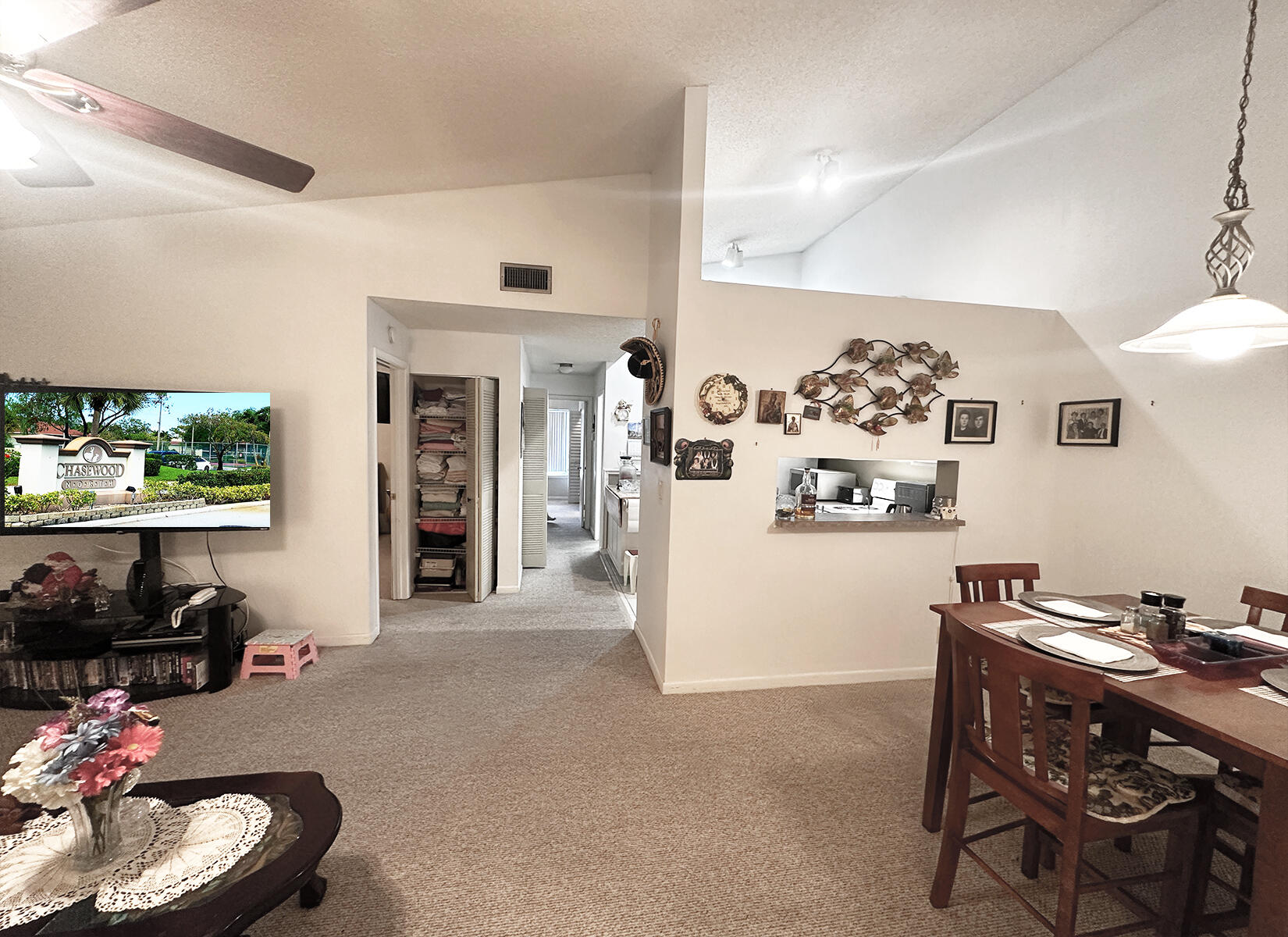 6543 Chasewood Drive, Unit E Jupiter, FL 33458 - Photo 4 of 15 Living to hallway