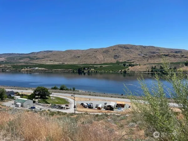 a view of a lake with a mountain in the background