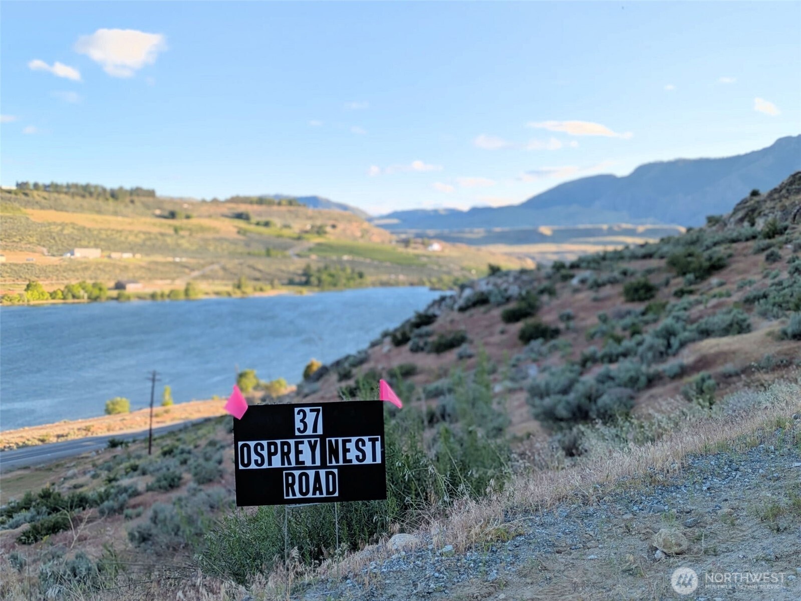 37 Osprey Nest Road Pateros, WA 98846 - Photo 13 of 13 a view of a lake with a mountain