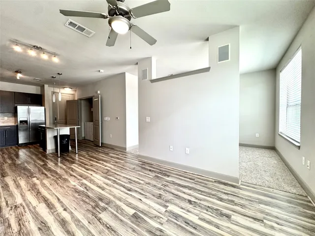 a view of a livingroom with a furniture