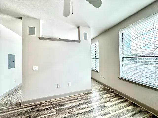 a view of a room with an empty space