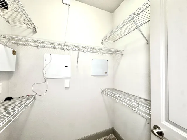 a bathroom with a shower and a sink