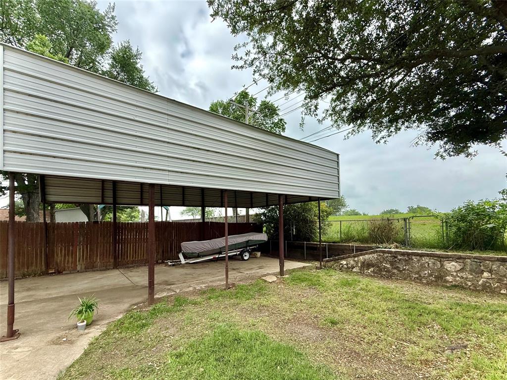 1206 Mildred Lane Benbrook, TX 76126 - Photo 36 of 38 Covered RV/Boat parking. Boat is negotiable!