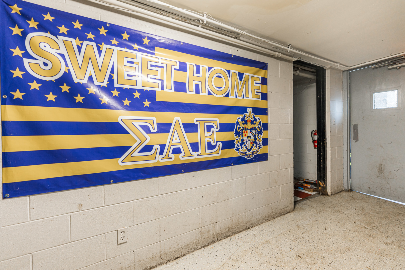 919 Greenbrier Road DeKalb, IL 60115 - Photo 3 of 23 a close up of a street sign