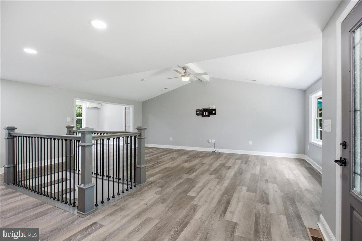 2175 Ponds Wood Road Huntingtown, MD 20639 - Photo 40 of 76 Entry area, living room with vaulted ceiling