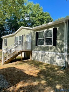 24911 Rainey Creek Road McKenney, VA 23872 - Photo 4 of 20 a view of a house with a yard