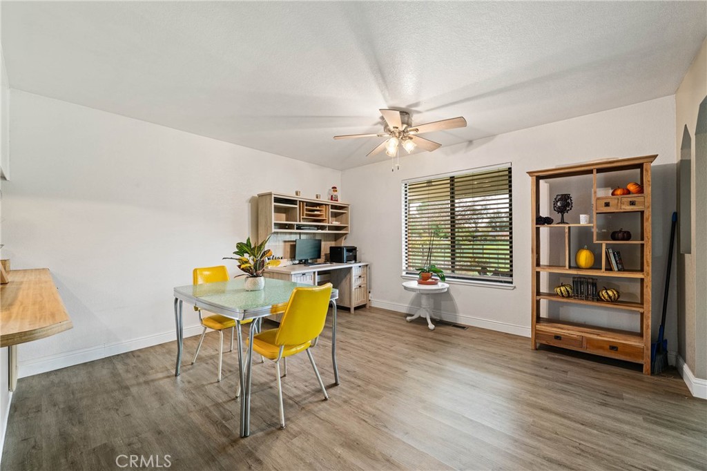 19425 Old Creek Road Hidden Valley Lake, CA 95467 - Photo 11 of 42 a living room with furniture and wooden floor