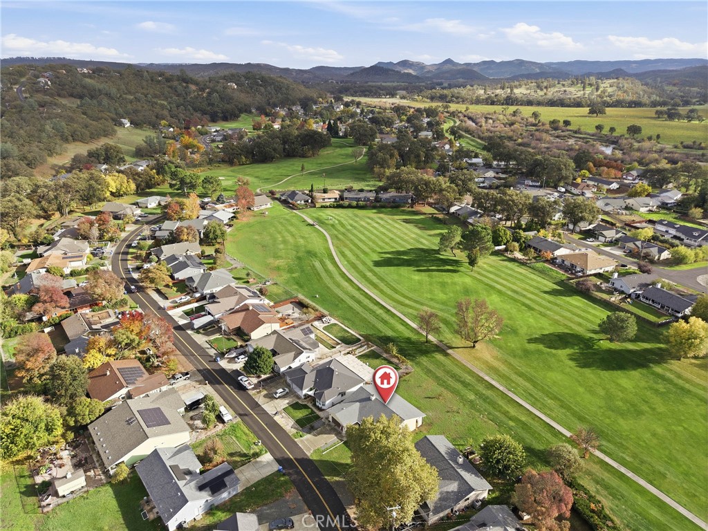 19425 Old Creek Road Hidden Valley Lake, CA 95467 - Photo 2 of 42 a view of a city with mountains in the background