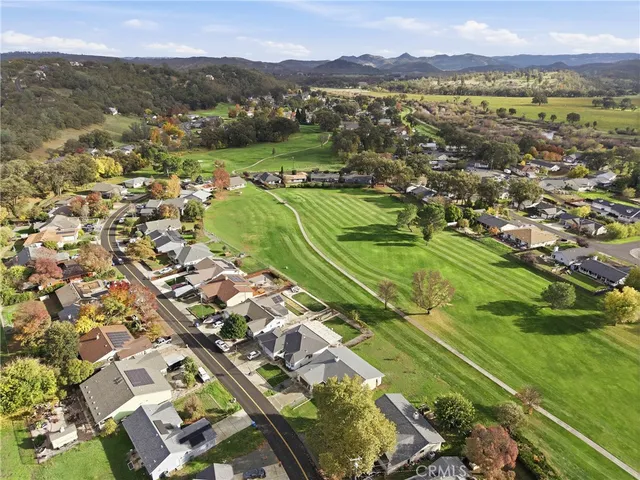 a view of a city with mountains in the background