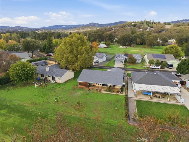 an aerial view of a house with garden