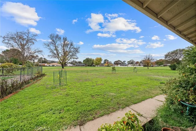 a view of a lake with a big yard