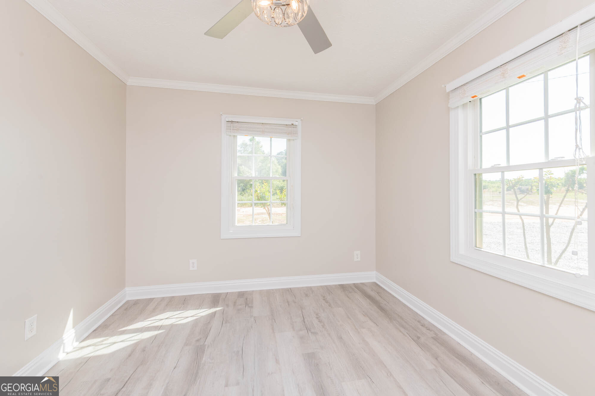 1661 Mule Creek Road Byron, GA 31008 - Photo 21 of 33 an empty room with a window