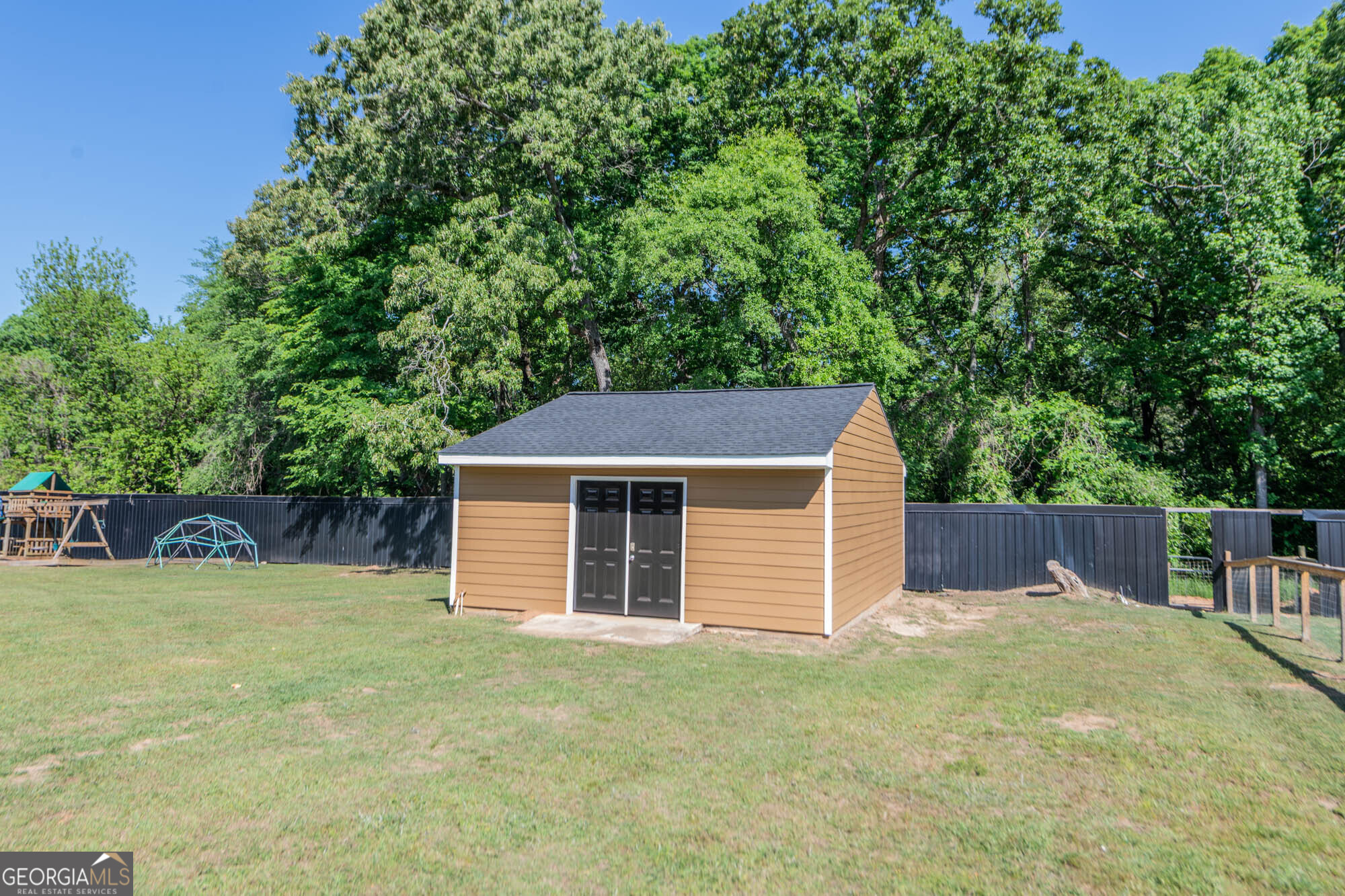 1661 Mule Creek Road Byron, GA 31008 - Photo 26 of 33 front view of a house with a yard
