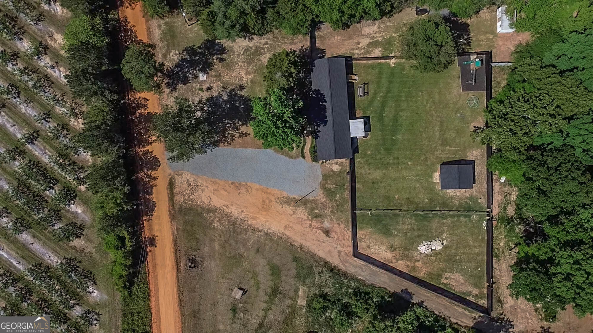 1661 Mule Creek Road Byron, GA 31008 - Photo 27 of 33 an aerial view of a house