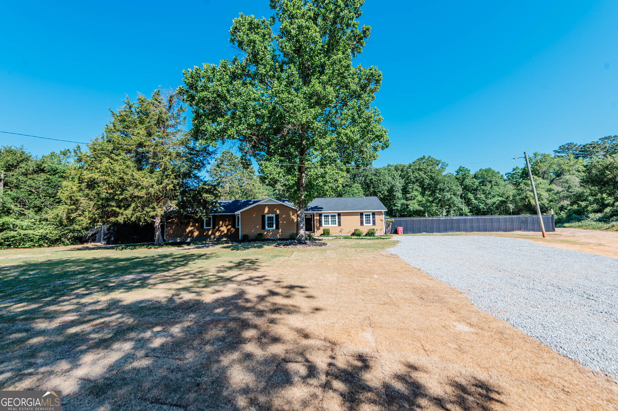 1661 Mule Creek Road Byron, GA 31008 - Photo 29 of 33 a view of a house with a yard