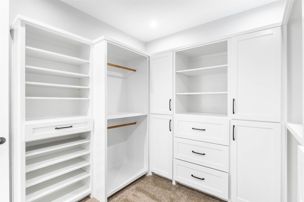 178 Balch Road Elgin, TX 78621 - Photo 14 of 40 a view of an empty walk in closet