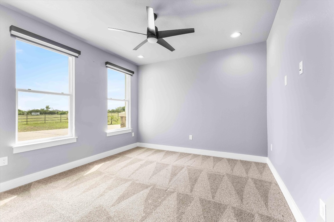178 Balch Road Elgin, TX 78621 - Photo 25 of 40 wooden floor in an empty room with a window