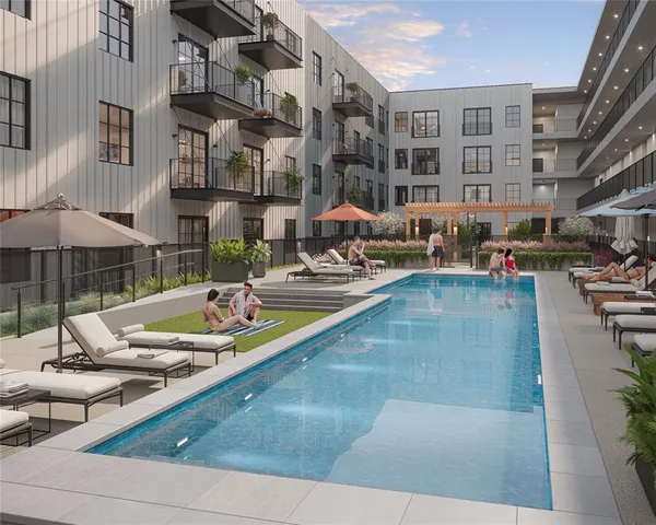 a view of a patio with swimming pool