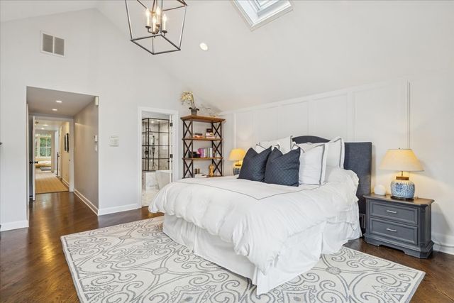 a bathroom with a shower and a toilet
