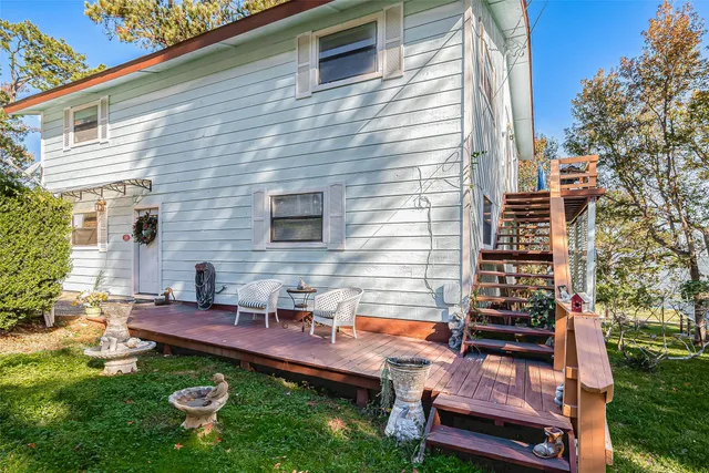 a backyard of a house with seating space