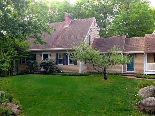 38 Mason Road Holden, MA 01522 - Photo 1 of 24 a front view of a house with a yard and a porch