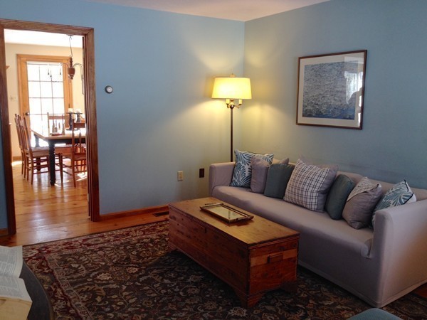 38 Mason Road Holden, MA 01522 - Photo 11 of 24 a living room with furniture and a lamp