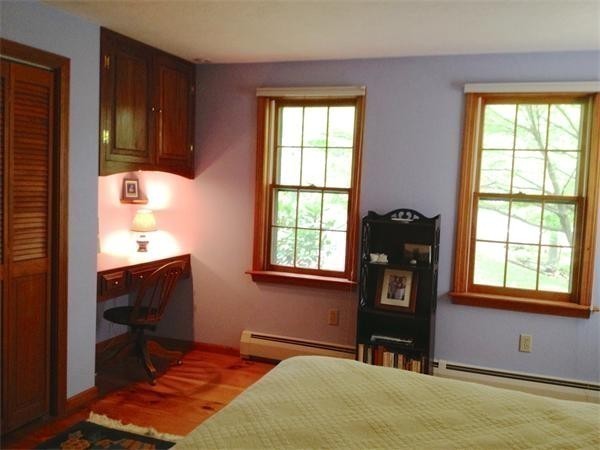 38 Mason Road Holden, MA 01522 - Photo 13 of 24 a bedroom with a bed window and table