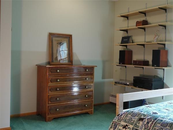 38 Mason Road Holden, MA 01522 - Photo 19 of 24 a bedroom with a bed and a cabinets