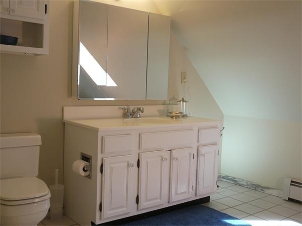 38 Mason Road Holden, MA 01522 - Photo 20 of 24 a bathroom with a sink vanity and a toilet