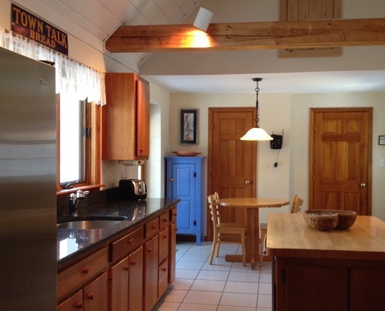 38 Mason Road Holden, MA 01522 - Photo 2 of 24 a kitchen with a sink and a stove