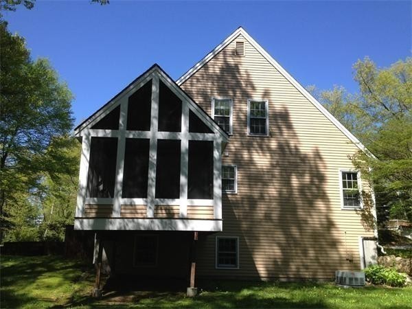 38 Mason Road Holden, MA 01522 - Photo 22 of 24 a view of house with yard and sitting area