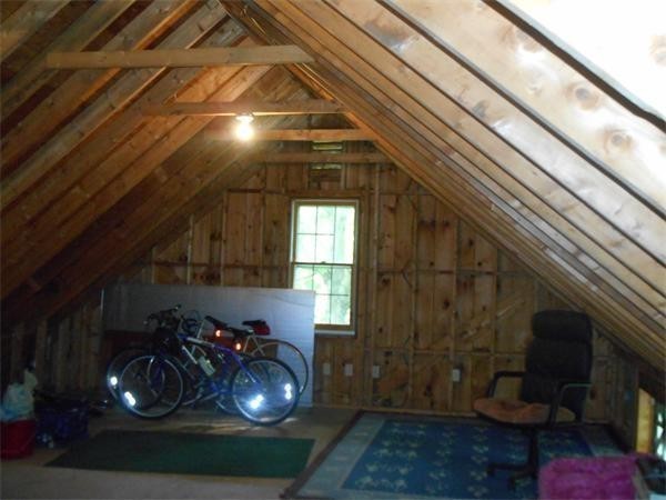 38 Mason Road Holden, MA 01522 - Photo 23 of 24 a room with water heater and wooden walls