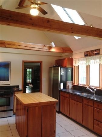 38 Mason Road Holden, MA 01522 - Photo 4 of 24 a spacious bathroom with a granite countertop sink and a large mirror