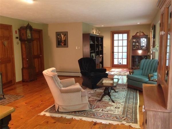 38 Mason Road Holden, MA 01522 - Photo 6 of 24 a living room with furniture a rug and a window