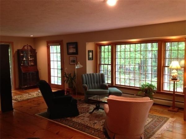 38 Mason Road Holden, MA 01522 - Photo 8 of 24 a living room with furniture and large windows