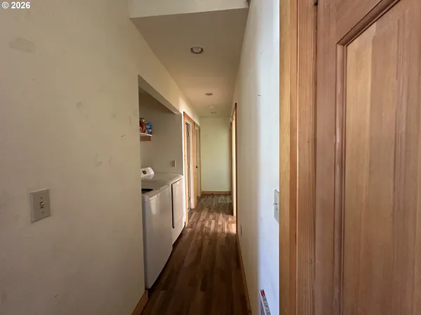 a view of a bathroom from the hallway