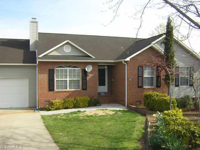 Exterior Front. Original model home, vaulted ceiling and gas log f/p in LR, Chair rail mouldings, carpet and wood laminate, Step saver kitchen