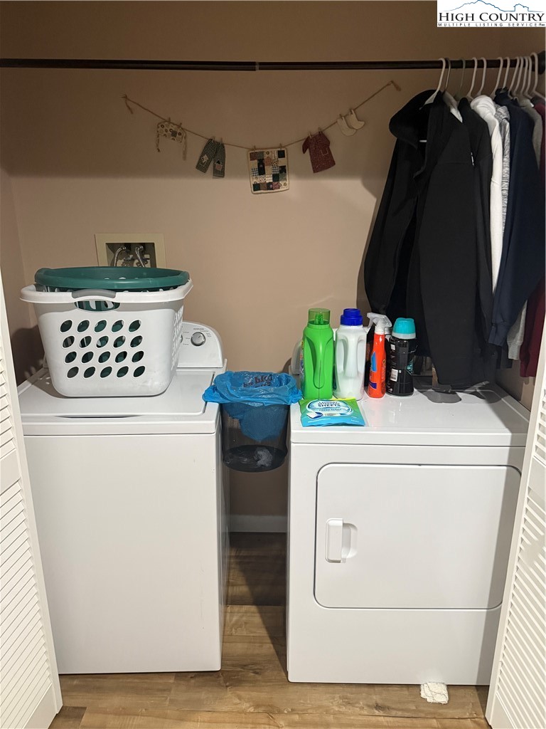 61 River Loop Newland, NC 28657 - Photo 27 of 38 a utility room with dryer and washer