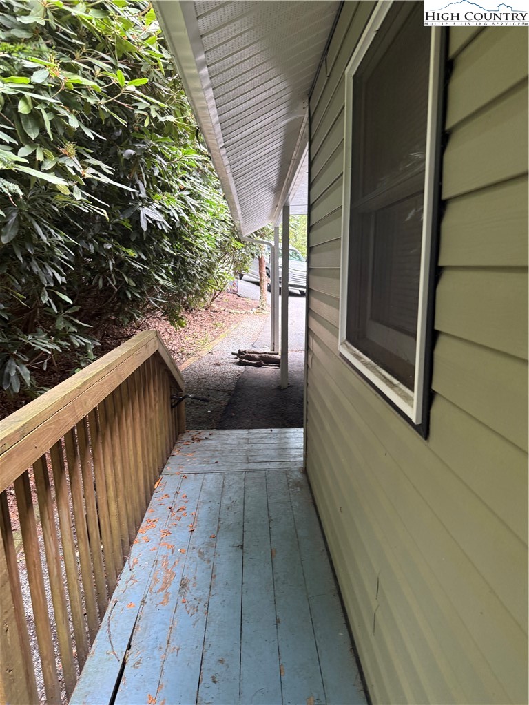 61 River Loop Newland, NC 28657 - Photo 33 of 38 a view of balcony with wooden floor