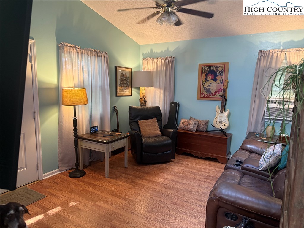 61 River Loop Newland, NC 28657 - Photo 6 of 38 a living room with furniture and a window