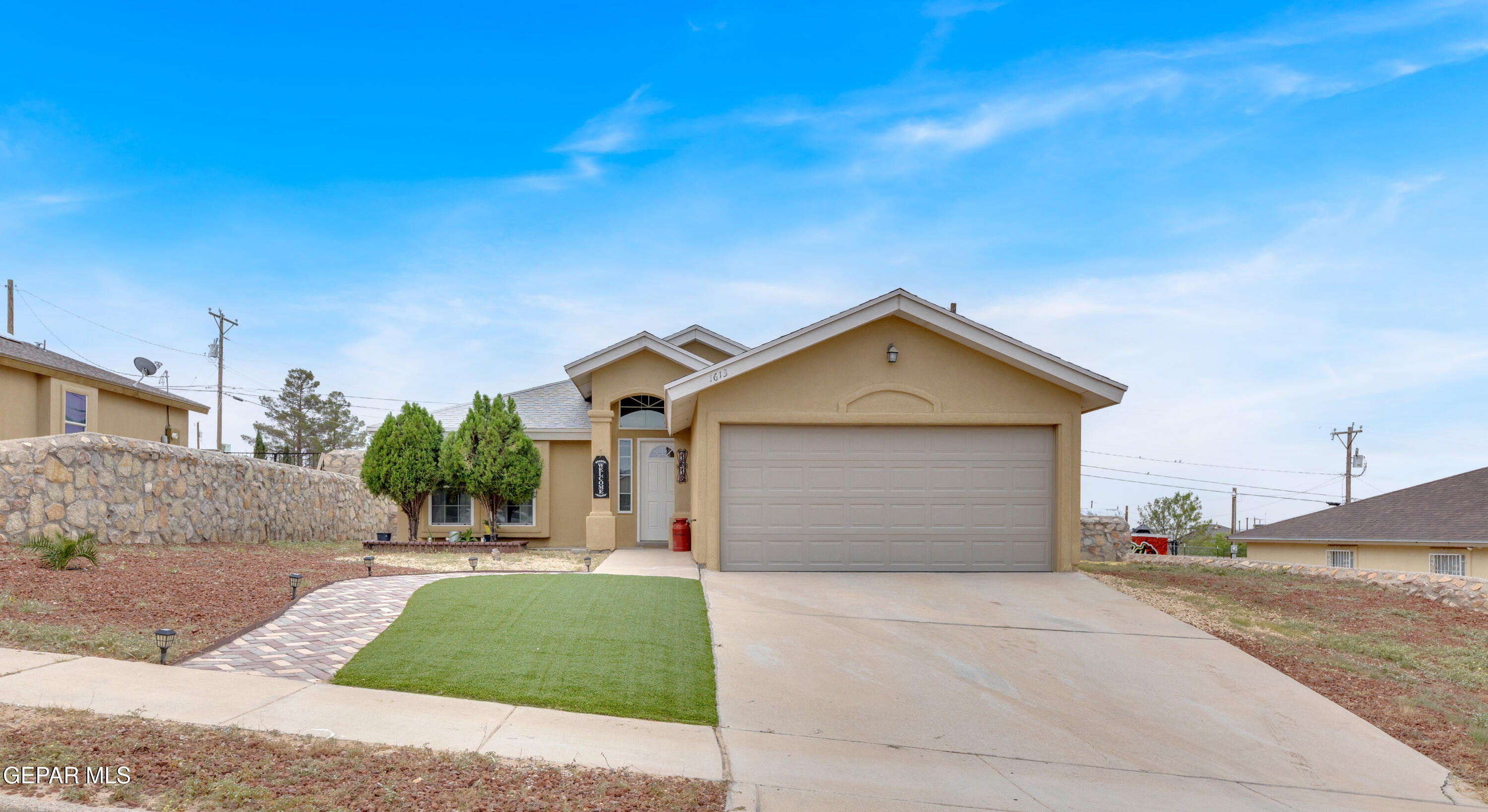 a view of garage yard and tree