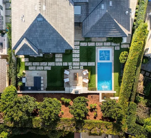 an aerial view of a house with a garden