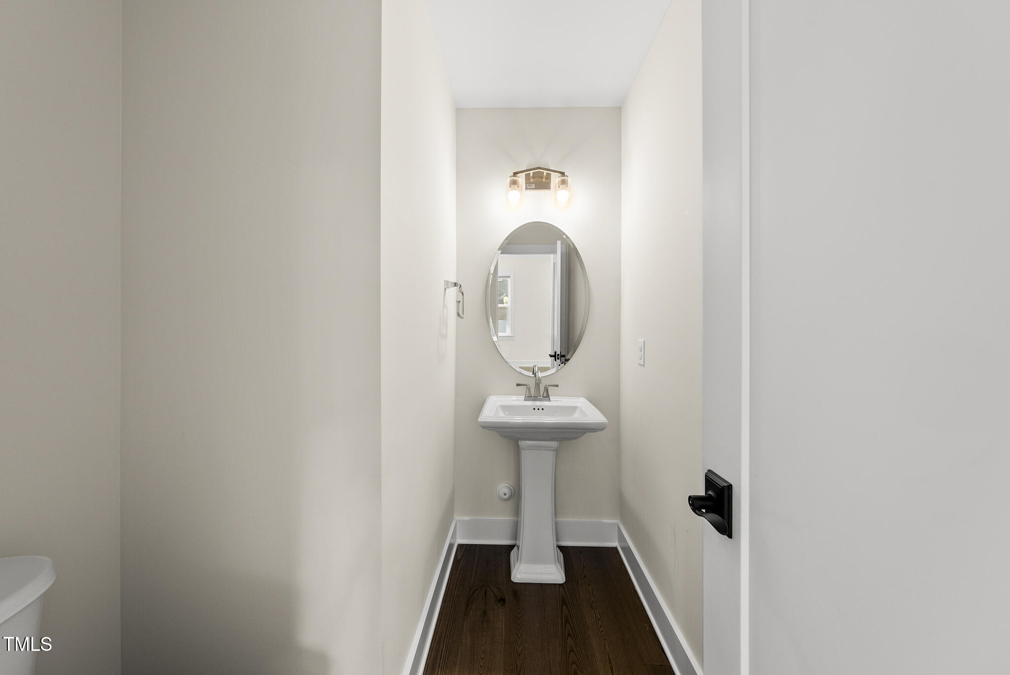 5501 Cedar Mill Drive Raleigh, NC 27606 - Photo 19 of 37 Powder Room