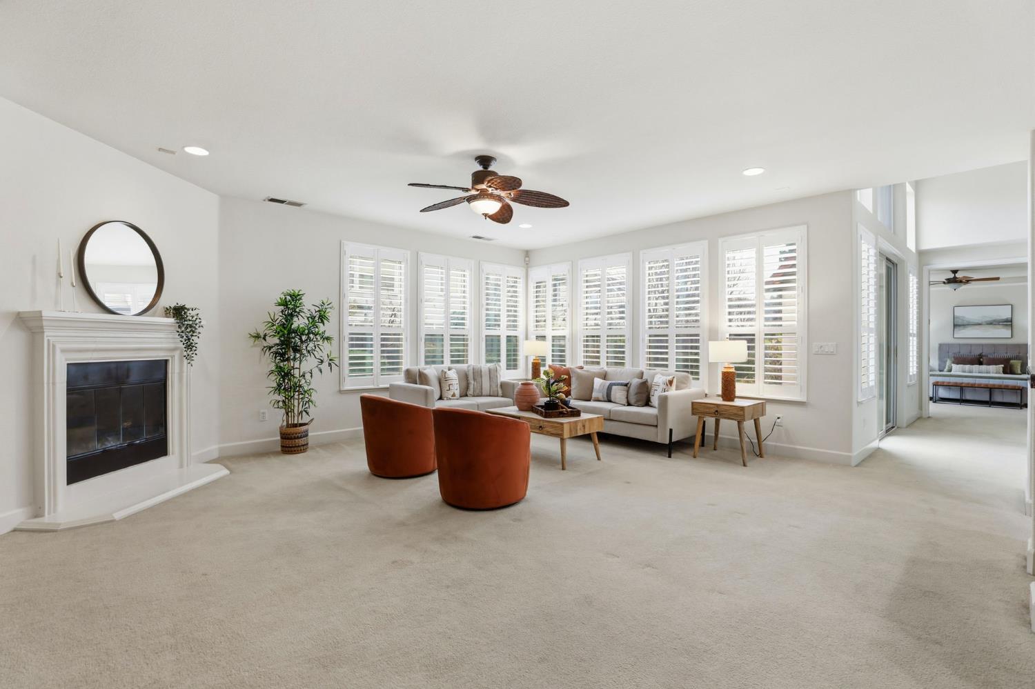 2624 West Pintail Way Elk Grove, CA 95757 - Photo 2 of 65 a living room with furniture and a fireplace