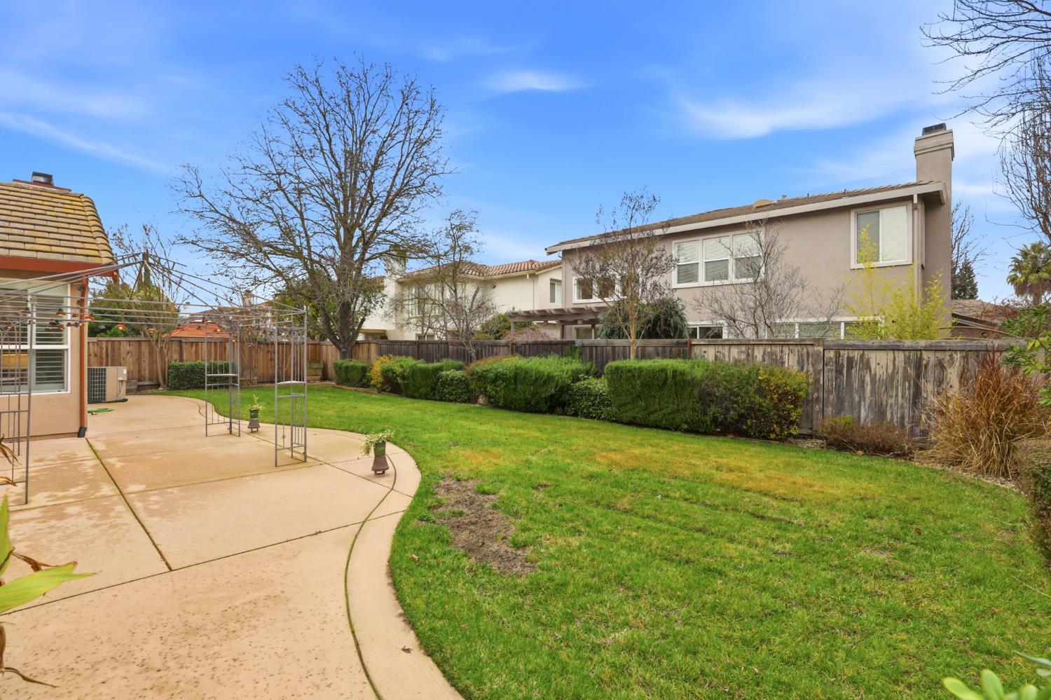 2624 West Pintail Way Elk Grove, CA 95757 - Photo 45 of 65 a view of a backyard with a garden and plants