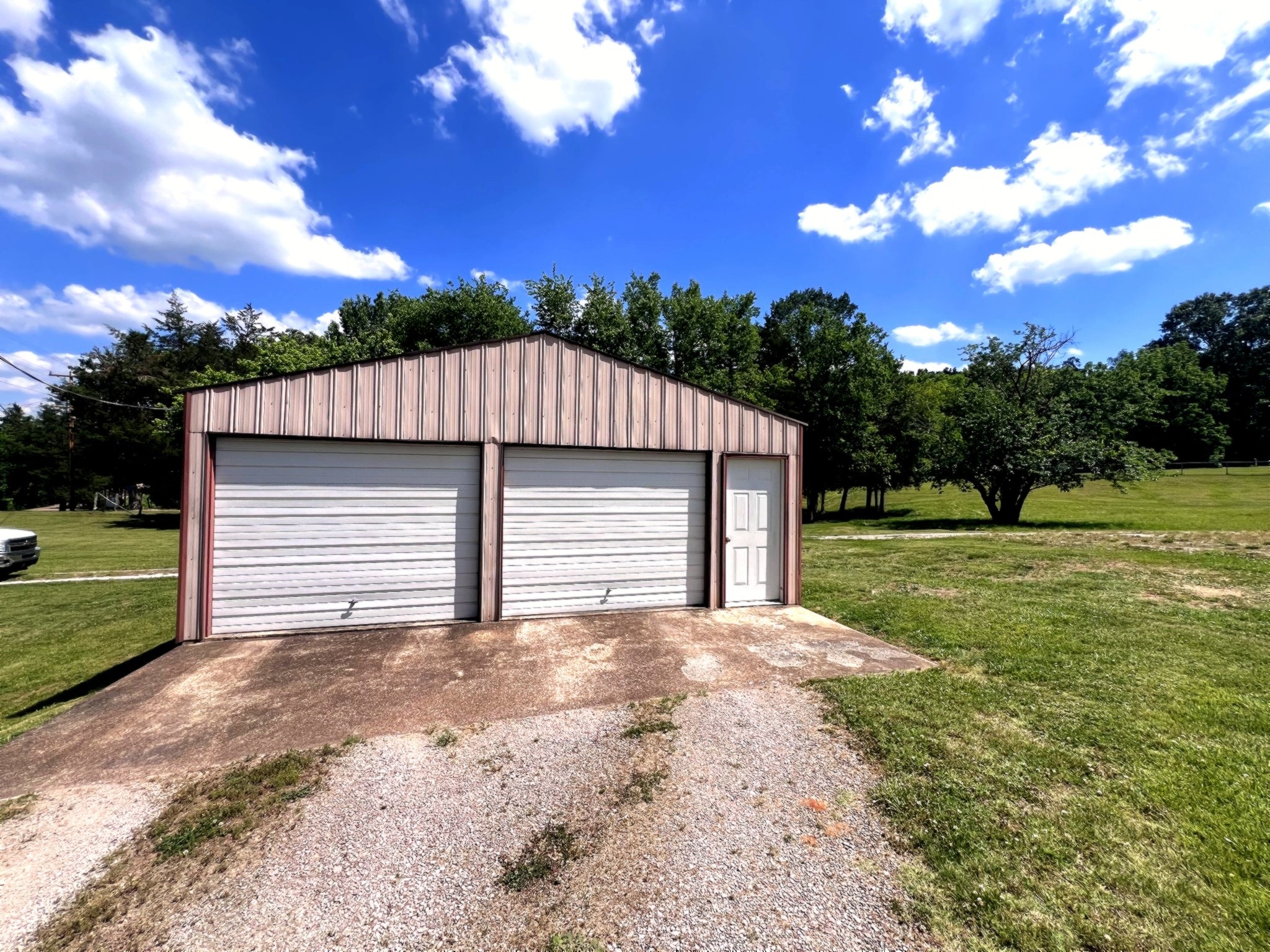 1133 Culps Bend Road Clifton, TN 38425 - Photo 30 of 51 a view of a house with a yard