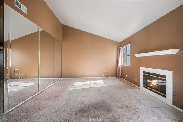 a view of a livingroom with a fireplace